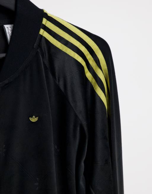 Chaqueta adidas best sale amarilla y negra