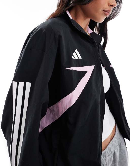 Chaqueta de chándal negra, rosa auténtico y blanca con diseño