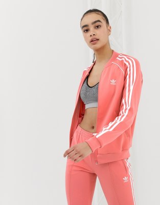 Convertir escalera mecánica Motear Chaqueta de chándal rosa de adidas Originals | ASOS