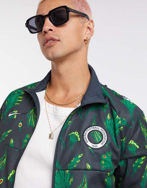 Sano Teoría de la relatividad Mona Lisa Chaqueta de chándal verde con estampado de Nigeria Anthem de Nike Football  | ASOS