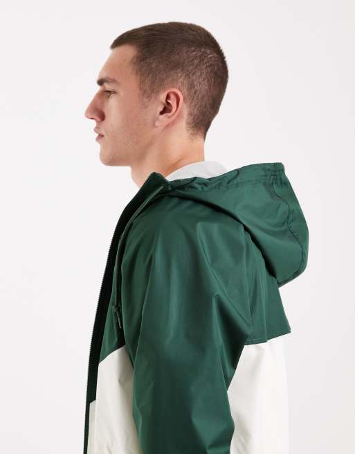 Chaqueta de chándal verde oscuro y blanca Windrunner de Nike, 4 de 5