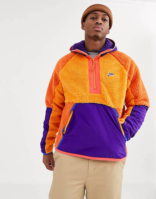 Escandaloso nacimiento bádminton Chaqueta de invierno en naranja/violeta de polar con media cremallera de  Nike | ASOS