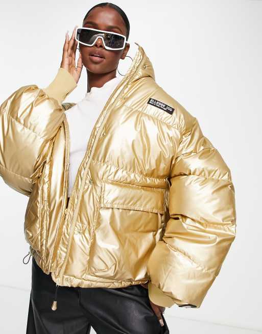 Chaqueta de plumas dorado metalizado con logo de ellesse