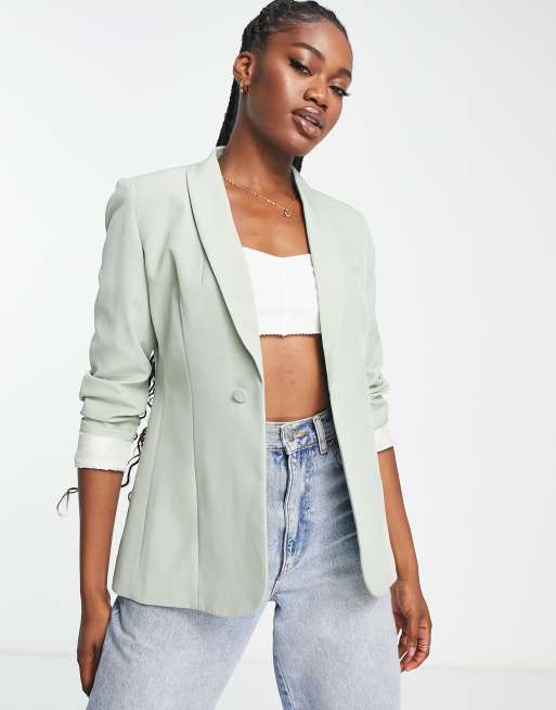 Chaqueta de traje de dama de honor verde salvia de Little Mistress