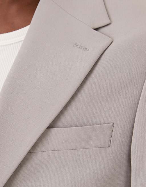Chaqueta de traje gris entallada de tejido elástico en cuatro direcciones de ASOS DESIGN, 4 de 5