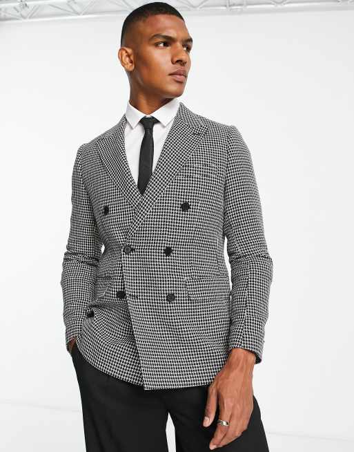 Chaqueta de traje negra y blanca entallada con patrón de espiguilla de Gianni Feraud