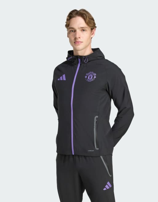 Chaqueta de viaje negra y morado intenso con diseño del Manchester United Tiro 25 Competition Vis Tech Travel de adidas Performance