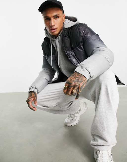 Chaqueta gris degradada acolchada con acabado texturizado de SikSilk