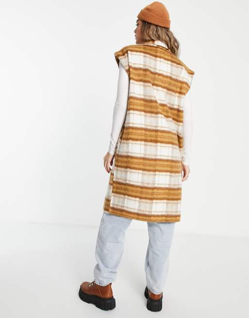 Chaqueta larga color crema y marrón a cuadros sin mangas de Noisy, 2 de 4