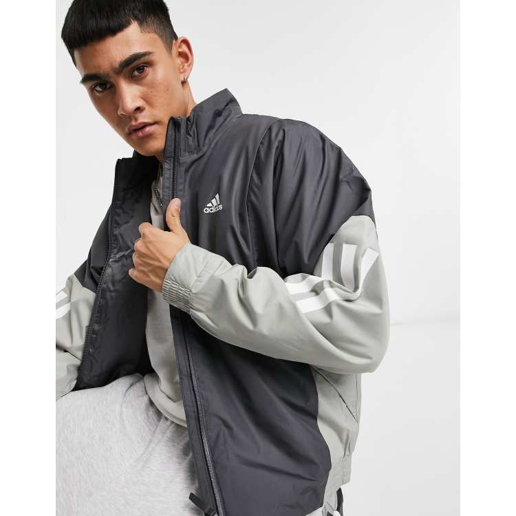 golf confesar Asistencia Chaqueta ligera gris de adidas | ASOS