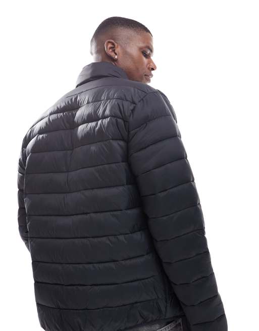 Chaqueta negra acolchada con cuello alzado de tejido de grosor