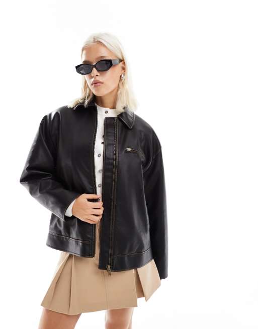 Chaqueta negra con cremallera de efecto cuero de Mango