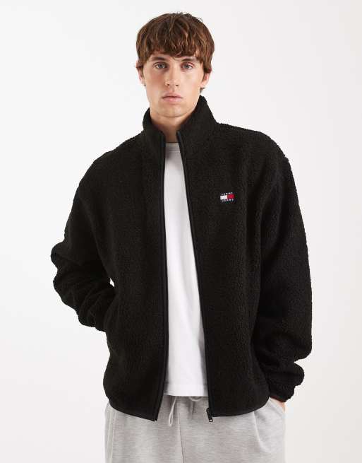 Chaqueta negra con cremallera y logo en el pecho de tejido tipo peluche de Tommy Jeans