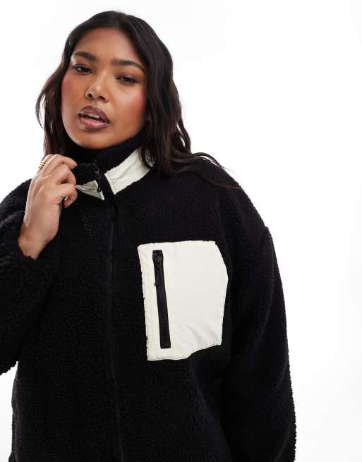 Chaqueta negra extragrande con cuello alzado de felpa tipo peluche de ONLY Curve