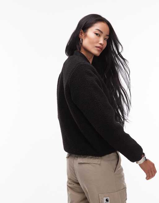 Chaqueta negra guateada de borreguito Janet de Carhartt WIP, 3 de 4