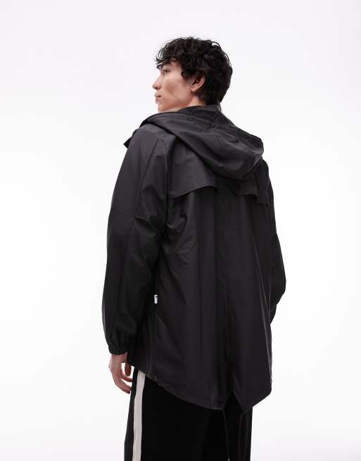 Chaqueta negra impermeable con abertura en la parte trasera 18010 de Rains, 3 de 4