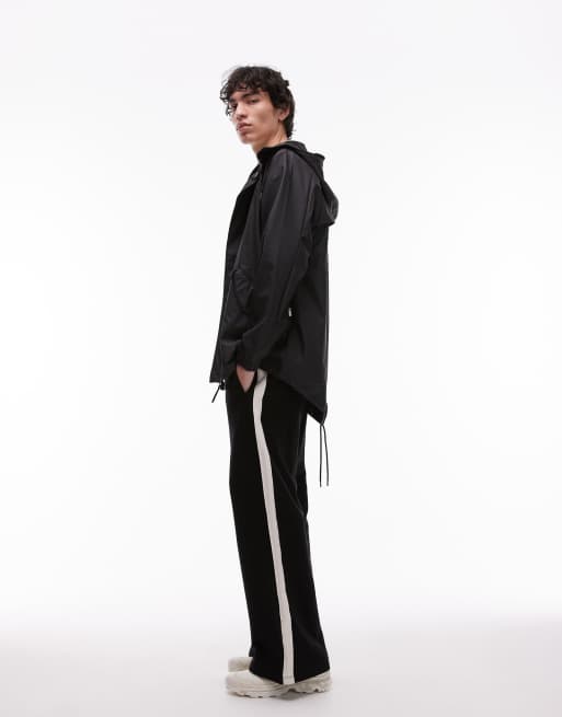 Chaqueta negra impermeable con abertura en la parte trasera 18010 de Rains, 4 de 4