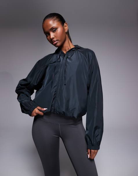 Chaqueta negra impermeable para correr con capucha y bolsillos con cremallera de 4505 - view 1