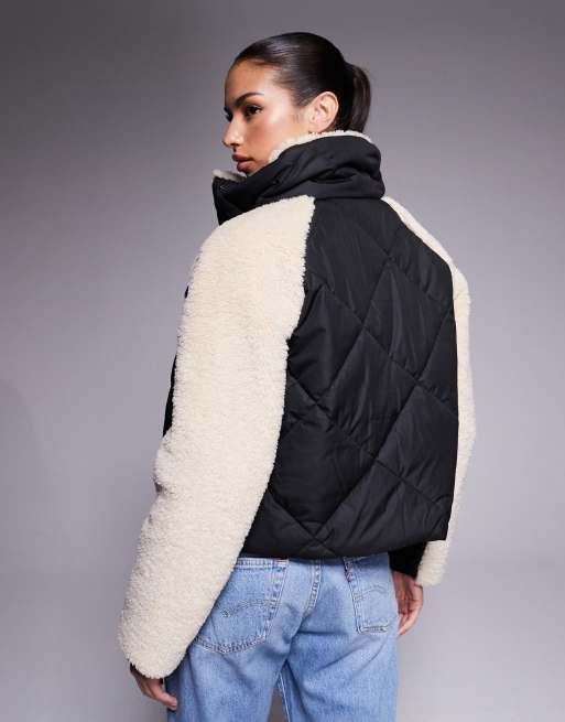 Chaqueta negra y beis guateada extragrande con mangas de polar de Barbour International , 2 de 4