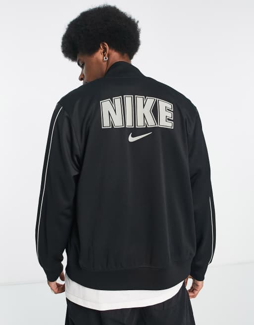 Chaqueta nike blanca y negra new arrivals