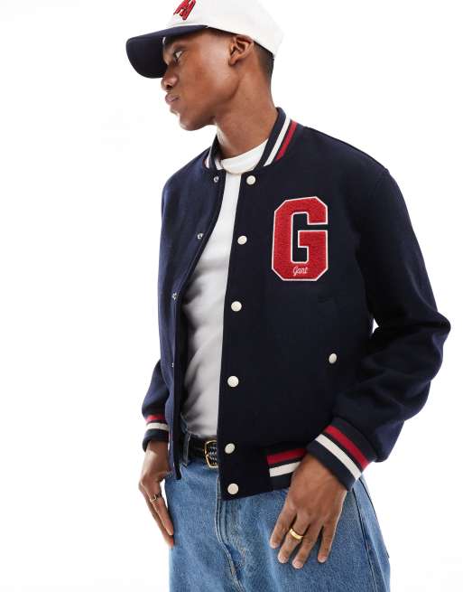 Chaqueta universitaria azul marino con logo de lana de la colección cápsula por el 75 aniversario de GANT