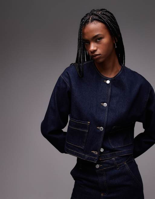 Chaqueta vaquera azul añil con pespuntes en contraste de Mango