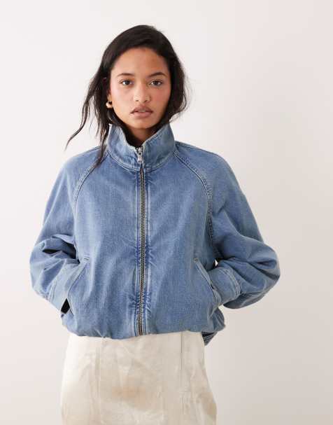 Chaqueta vaquera azul con lavado medio y detalles estilo bomber de ARKET - view 1