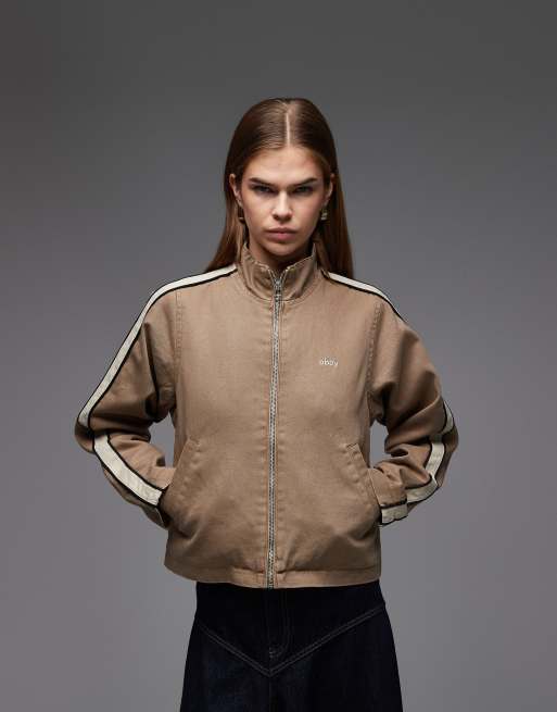 Chaqueta vaquera tipo chándal marrón y beis con raya lateral Astrid de Obey