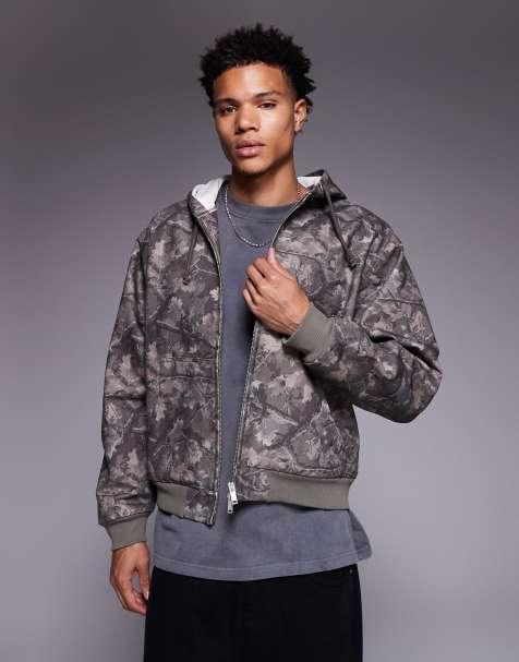 Chaqueta verde lavado con capucha, estampado de camuflaje y cremallera de lona Core de Faded Store - view 1