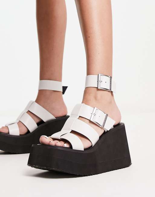 Caged hot sale wedge heels