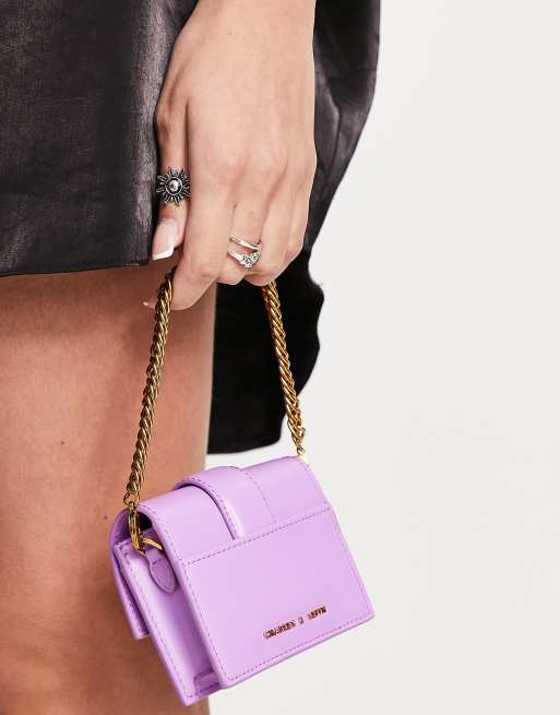 Charles & Keith card holder bag in purple with gold chain strap