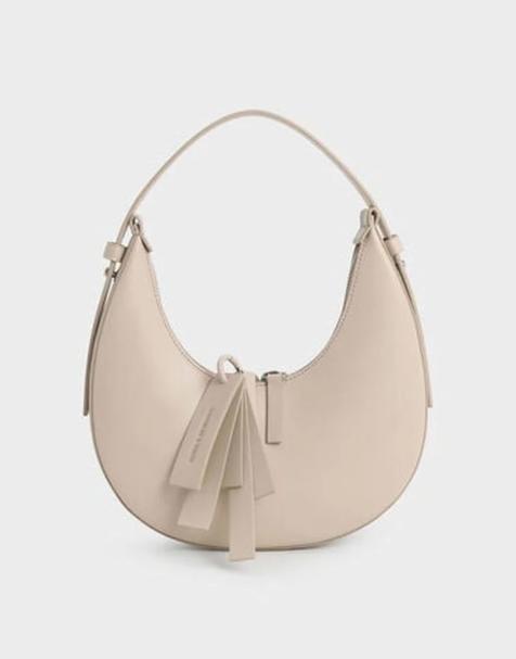 Charles & Keith Carey crescent bag in oat - view 1