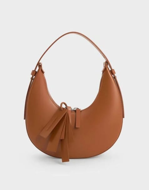 Charles & Keith Carey crescent bag in tan - view 1