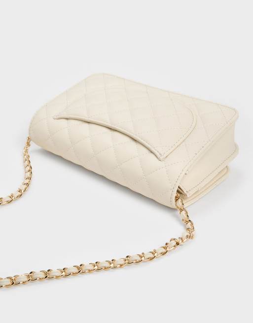 Charles & Keith Cressida quilted push-lock clutch in cream, 4 of 4