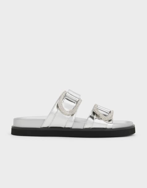 Charles & Keith Gabine crystal-embellished buckle metallic leather slides in silver - view 1