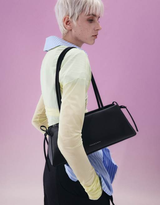 Charles & Keith Hazel bow elongated trapeze shoulder bag in noir, 3 of 4