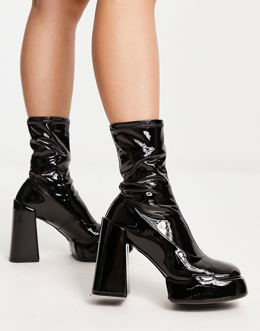 Charles & Keith heeled ankle boots in black patent