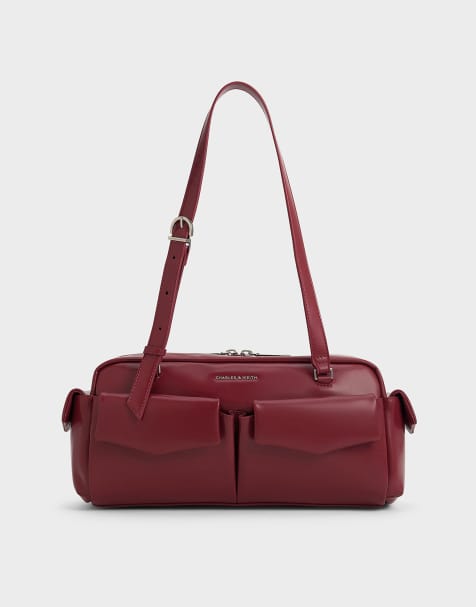 Charles & Keith Rachel elongated multi-pocket shoulder bag in burgundy - view 1