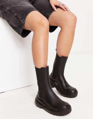 rubber calf boots in black