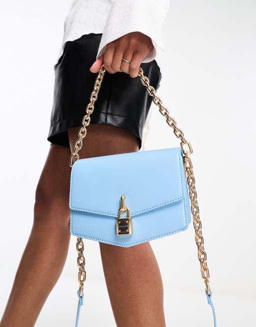 Charles Keith Suki crossbody bag with chain strap in blue ASOS