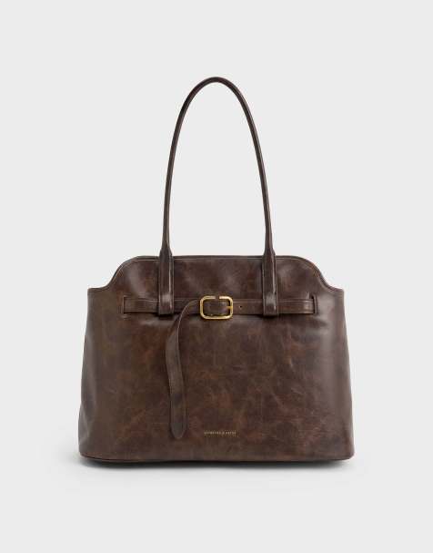 Charles & Keith Victoria belted trapeze tote bag in distressed coffee - view 1