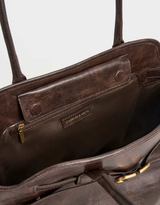 Charles & Keith Victoria belted trapeze tote bag in distressed coffee, 2 of 6