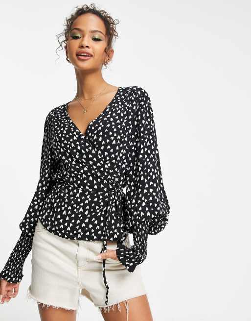 Charlie Holiday Franco printed heart wrap top in black | ASOS