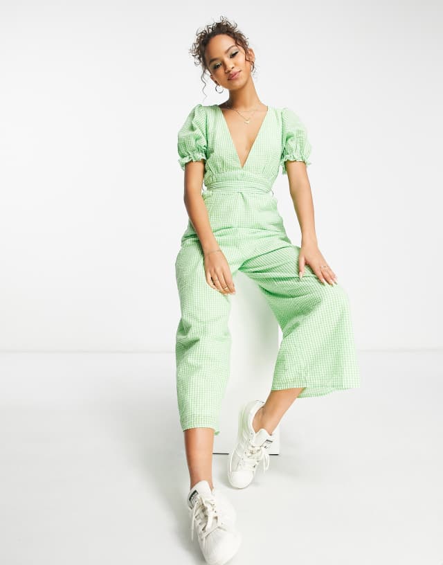 Charlie Holiday plunge neck jumpsuit in green