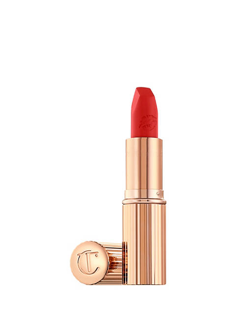 Informative Image of Charlotte Tilbury's Tell Laura lipstick exhibiting a summer make up trends 