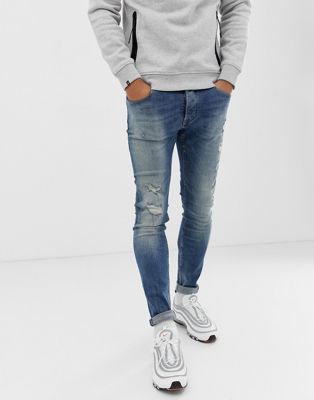 Chasin' – Ego Blaidd – Mörkblå slim jeans med slitna detaljer