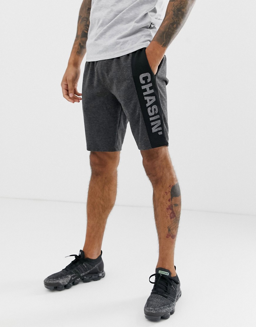 Chasin' – Jogger S.Rida – Grafitgrå sweatshorts med meshlogga