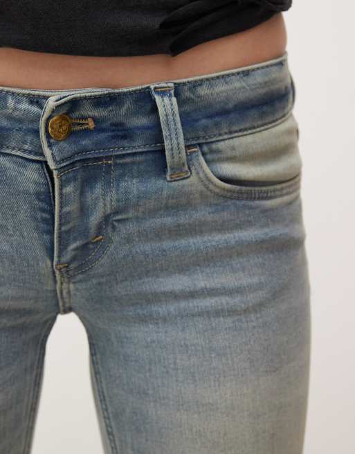 Cheap Monday – Blå, tvättade, stretchiga jeans med låg midja, utsvängd design och smutsig finish, 5 av 5
