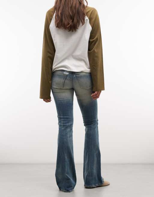 Cheap Monday Booty Bei stretch low rise bootcut jeans with distressed details in vintage blue wash, 2 of 5