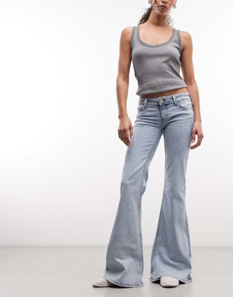 Cheap Monday - Jeans elasticizzati a vita bassa a zampa lavaggio blu - view 1